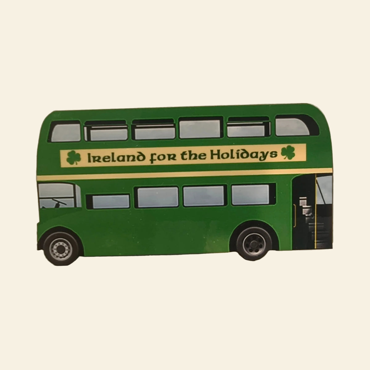 Green double-decker bus fridge magnet reading Ireland for the Holidays