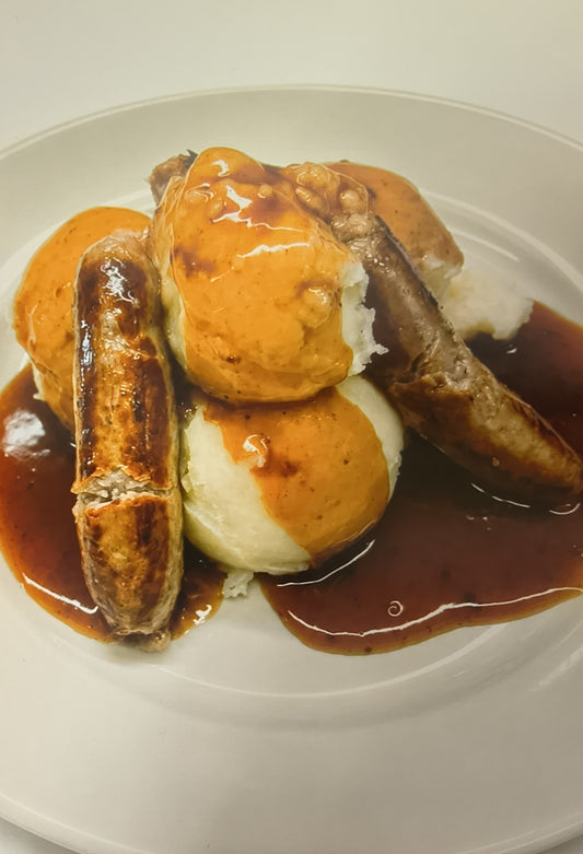 Bangers and mash with onion gravy, a Cupán Tae café special
