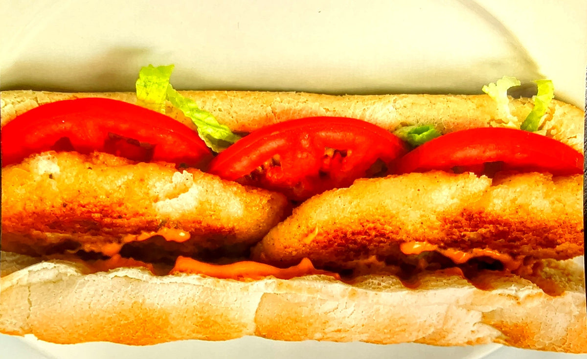 Chicken filet roll with tomato and lettuce
