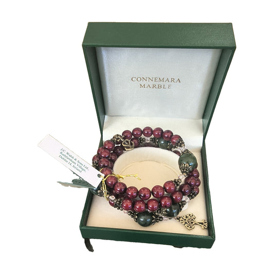 Red and Connemara marble wrap bracelet with Celtic cross and Claddagh charms in Connemara Marble gift box