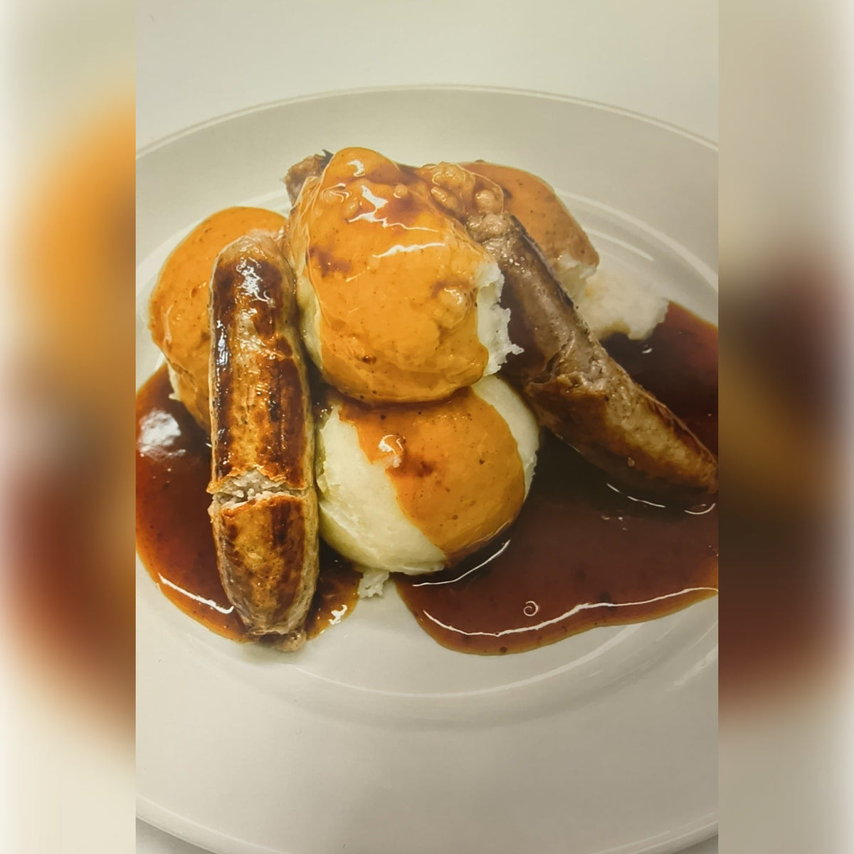 Bangers and mash with onion gravy, a Cupán Tae café special